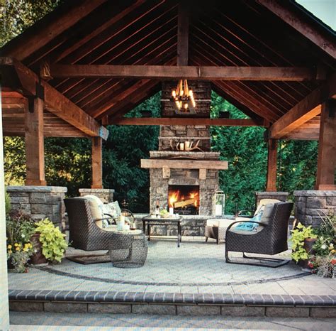 by the foreplace|outdoor fireplaces.